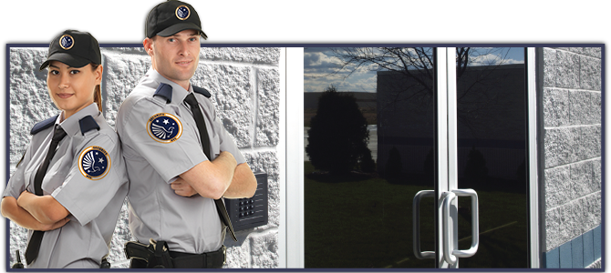 security guards in front of keypad and door